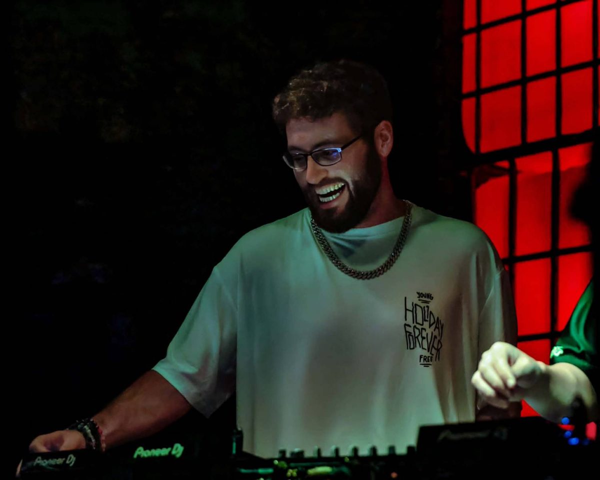 Citron smiling behind the decks